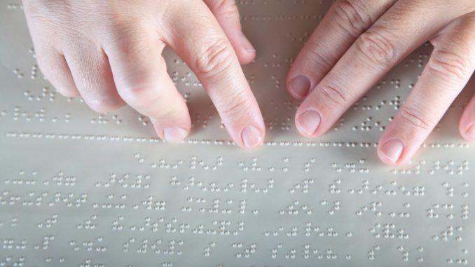 braille y manos