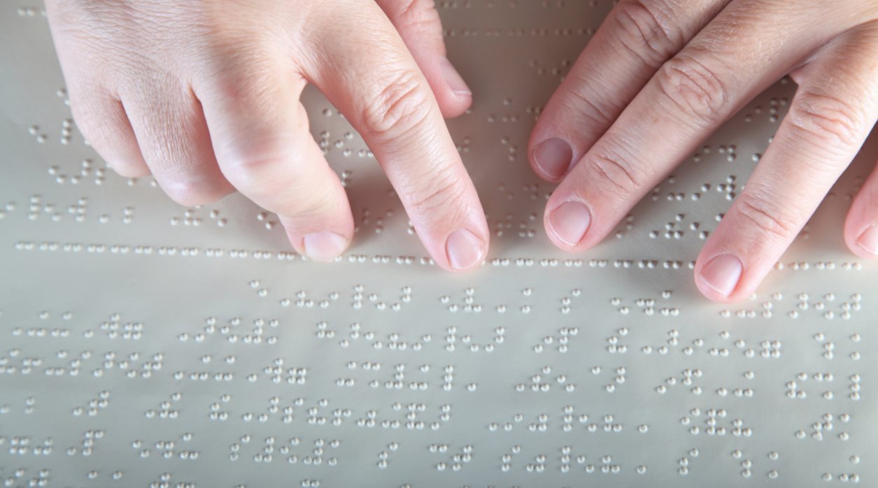 braille y manos